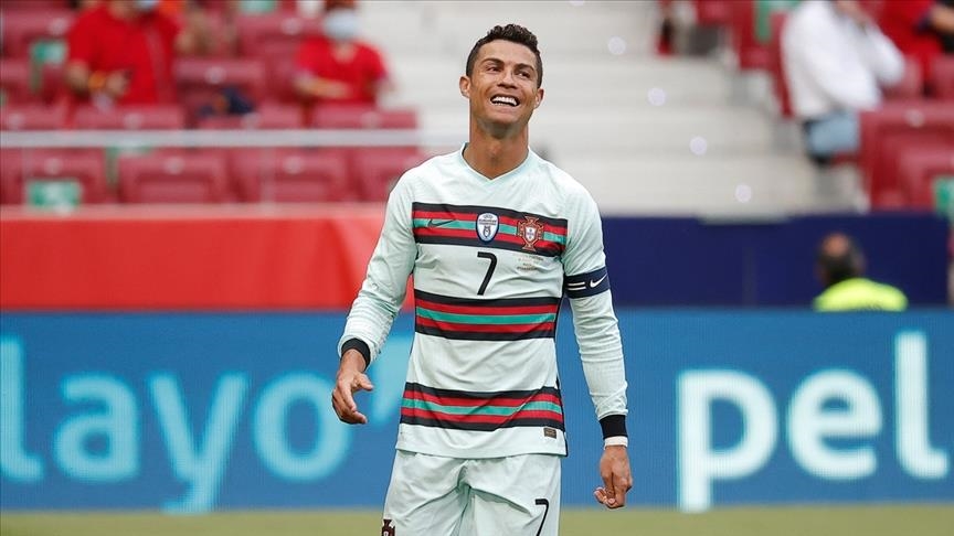 Portugal beats stubborn Hungary as Ronaldo set Euros record